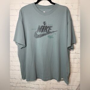 The Nike Tee Sportswear loose fit graphic t-shirt size XL in aviator grey
